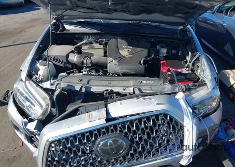 2018 Toyota Tacoma Trd Off Road from USA, damaged, VIN 3TMAZ5CN7JM056899